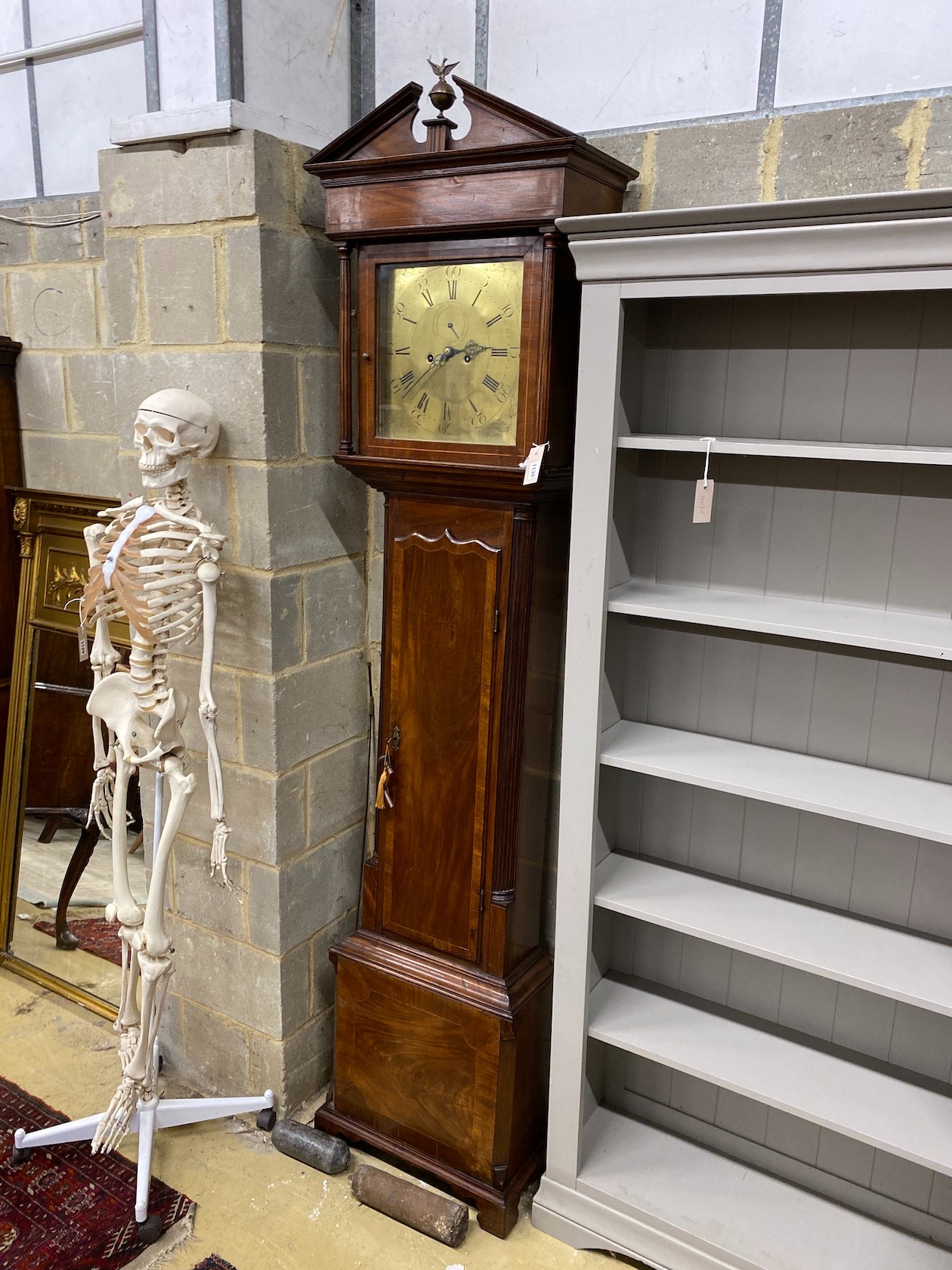 An early 19th century Irish mahogany eight day longcase clock, the square brass dial marked Buchanan, Dublin, height 228cm